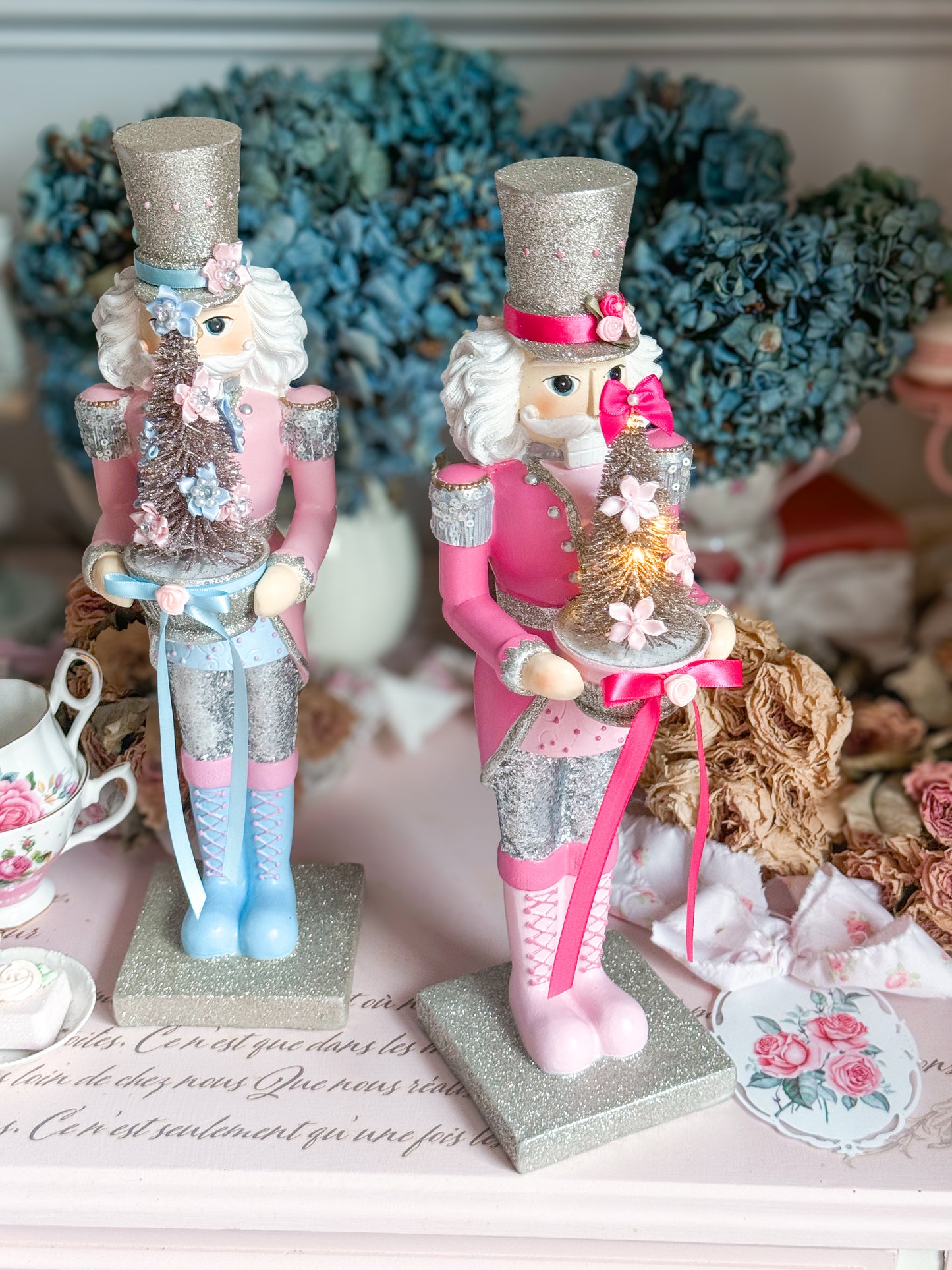 Bespoke Pink and Silver Hand Painted Nutcracker holding LED Light up Tree with Flowers and Bows