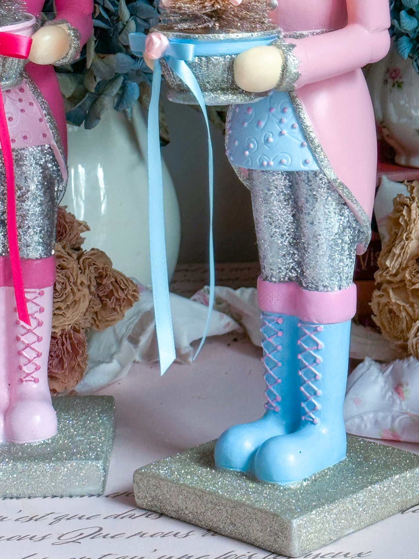 Bespoke Pastel Pink, Blue and Silver Hand Painted Nutcracker holding LED Light up Tree with Flowers and Bows