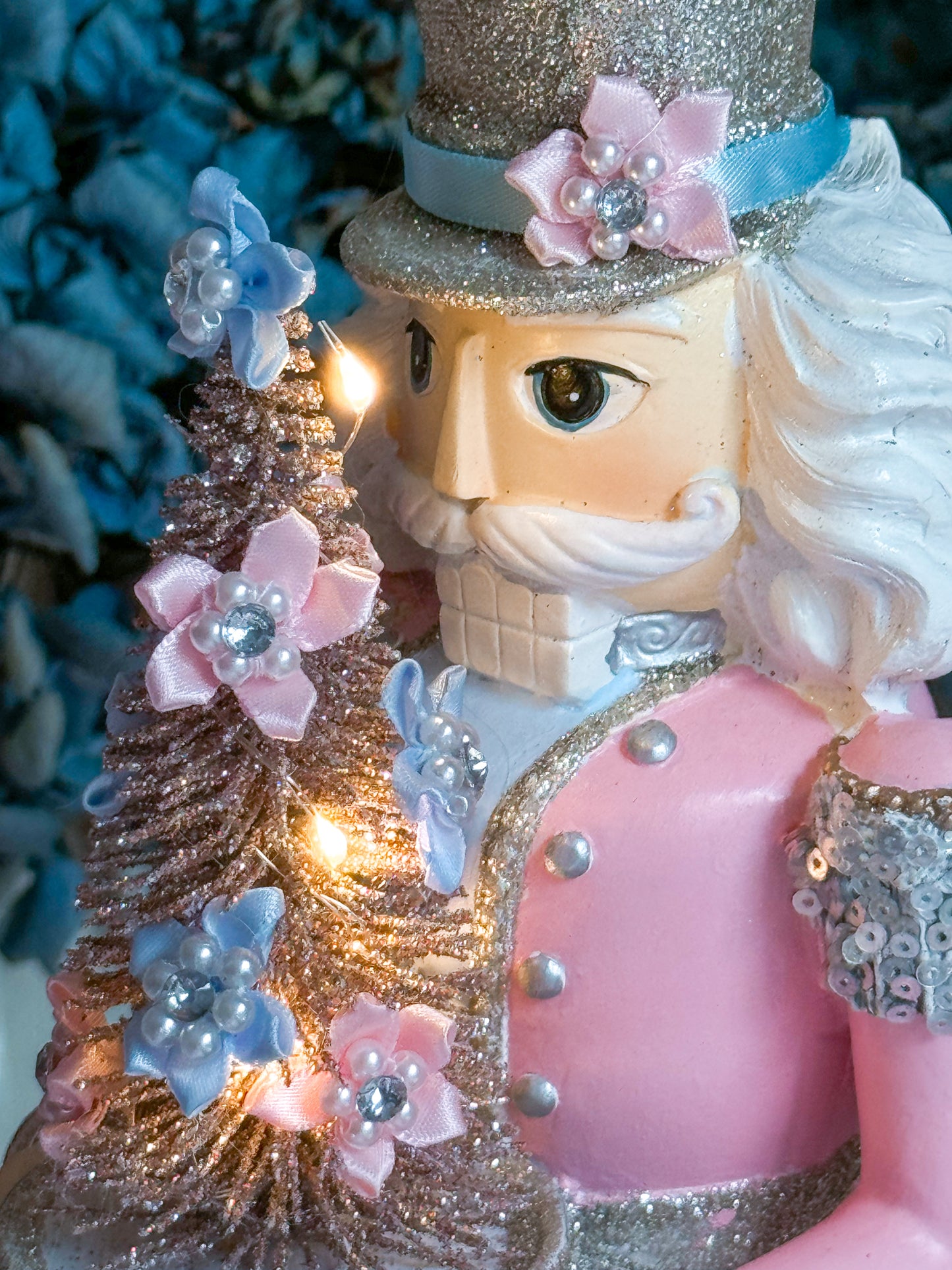 Bespoke Pastel Pink, Blue and Silver Hand Painted Nutcracker holding LED Light up Tree with Flowers and Bows