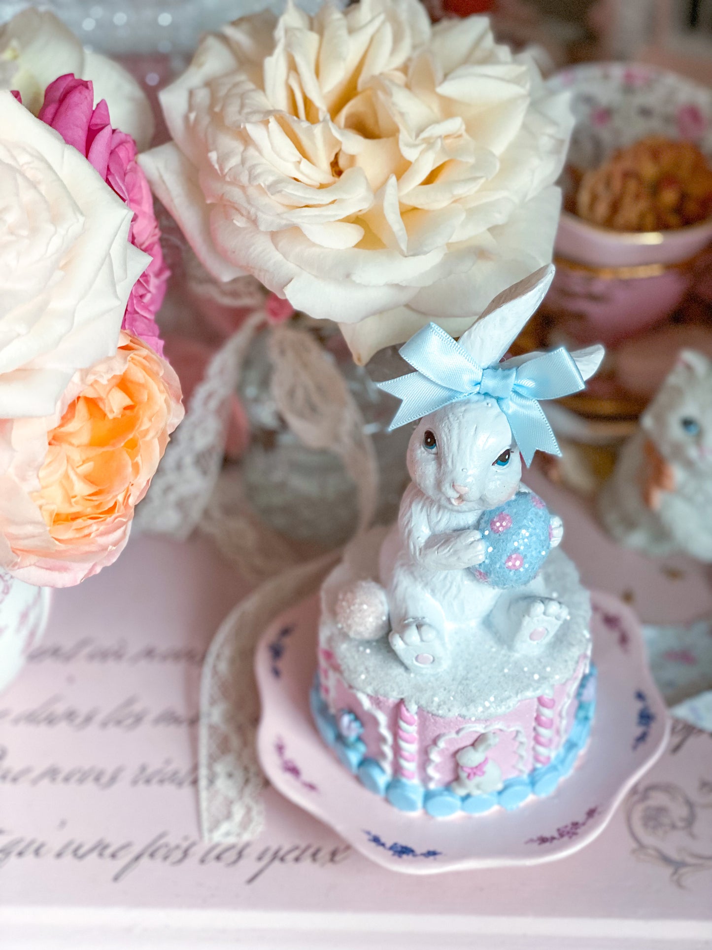 GLOW-UP COMMISSION: Bespoke Hand Painted Pastel Pink and Blue Easter Bunny on Cake