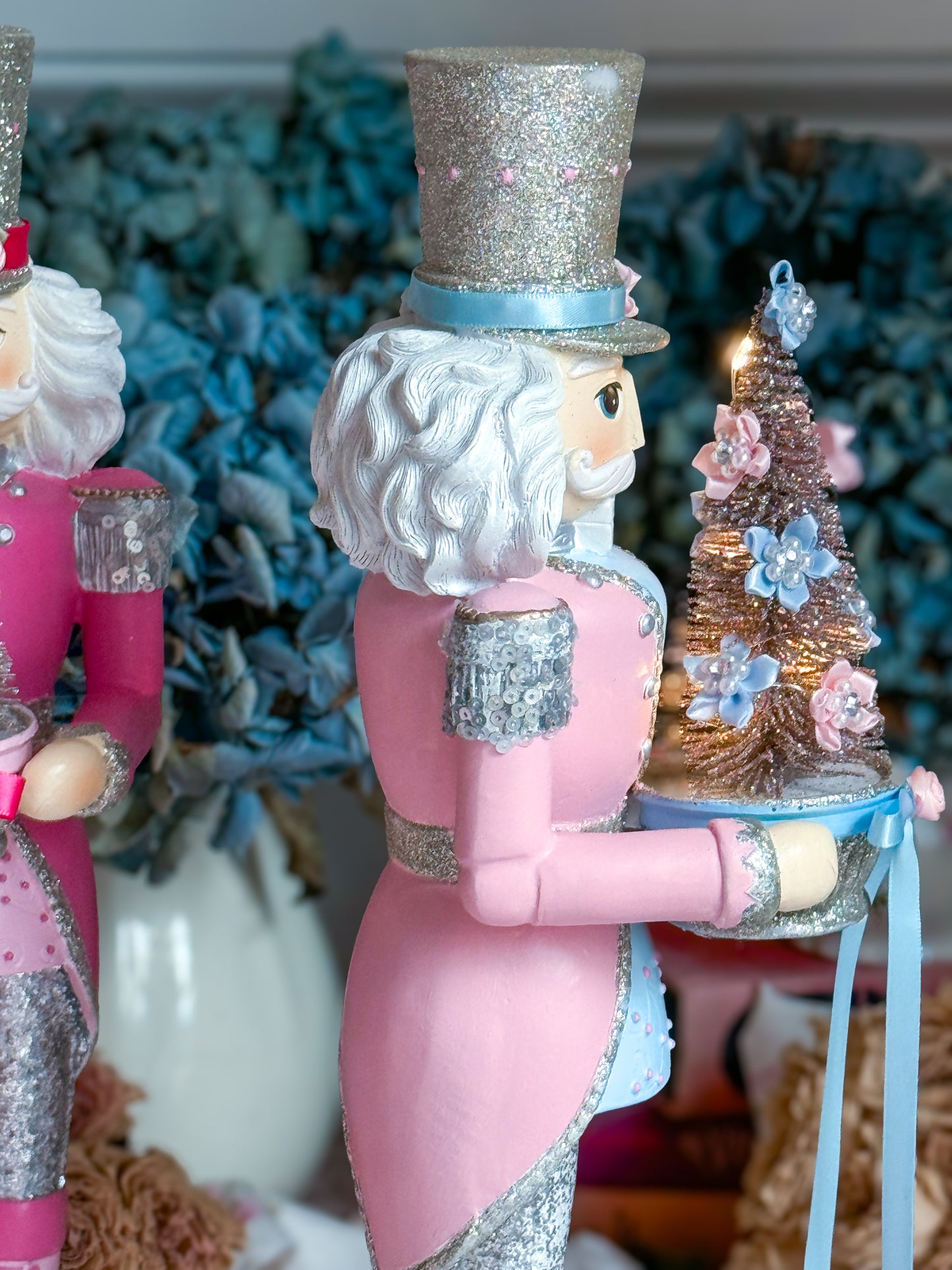 Bespoke Pastel Pink, Blue and Silver Hand Painted Nutcracker holding LED Light up Tree with Flowers and Bows