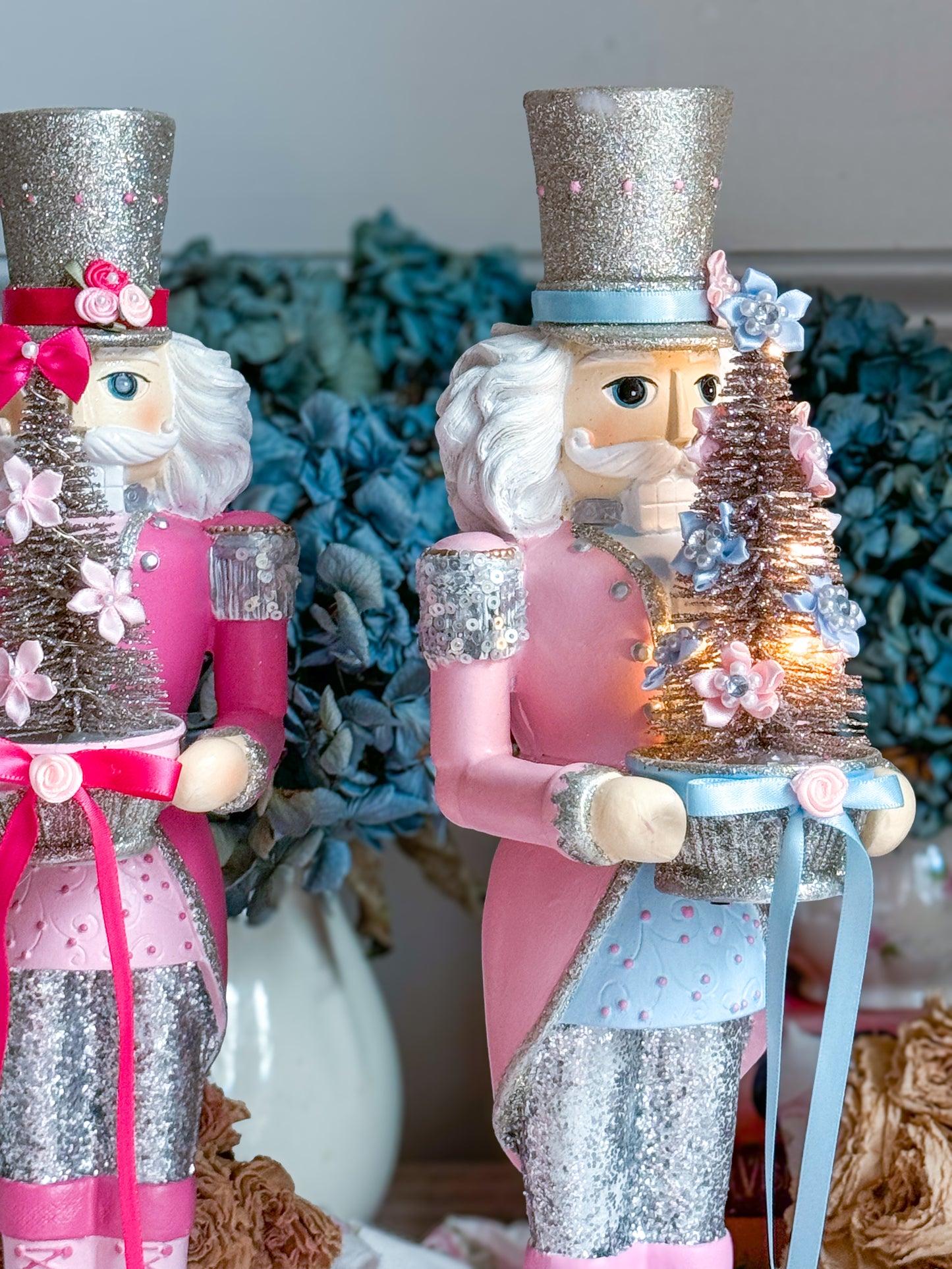 Bespoke Pastel Pink, Blue and Silver Hand Painted Nutcracker holding LED Light up Tree with Flowers and Bows