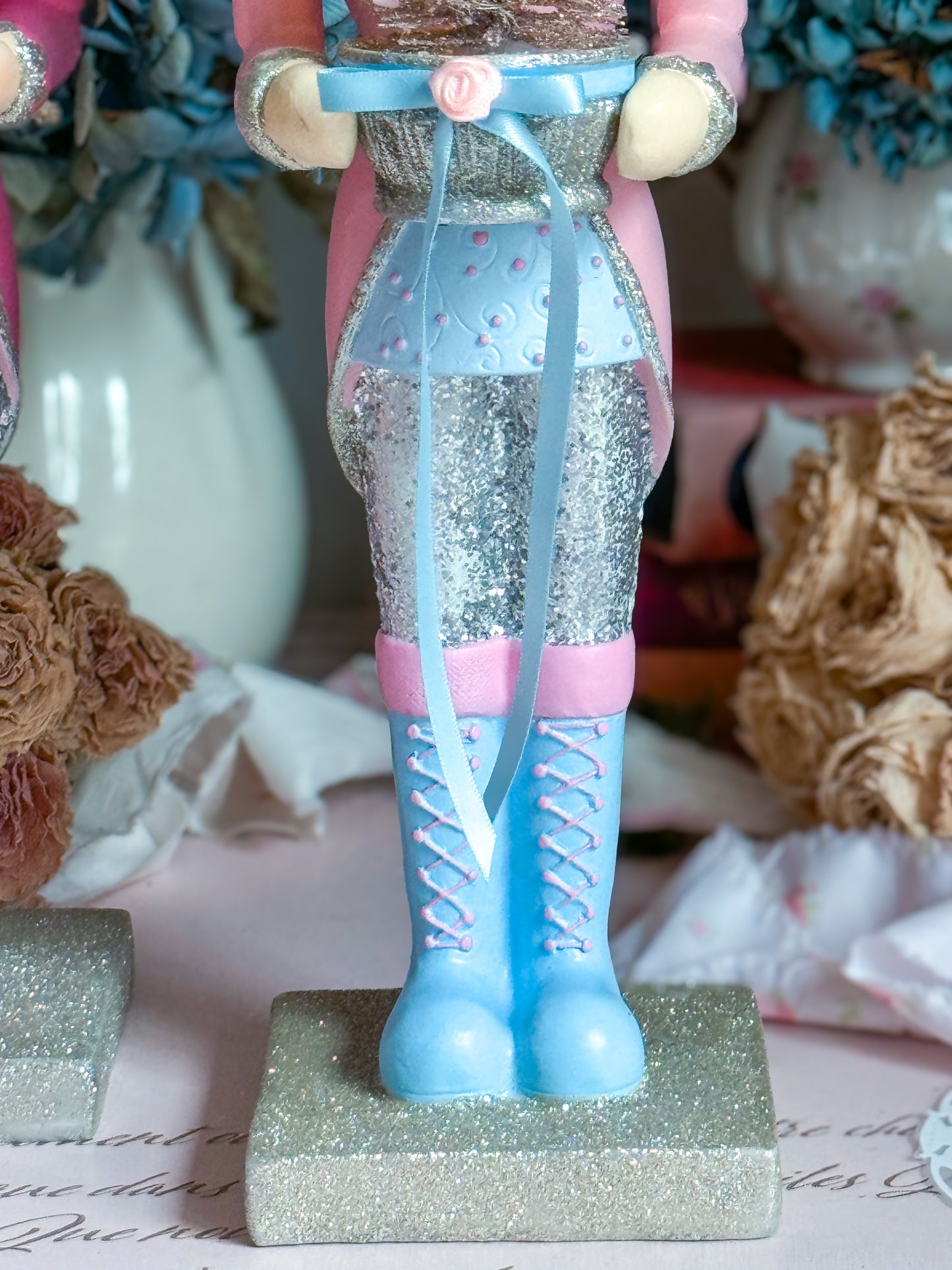 Bespoke Pastel Pink, Blue and Silver Hand Painted Nutcracker holding LED Light up Tree with Flowers and Bows