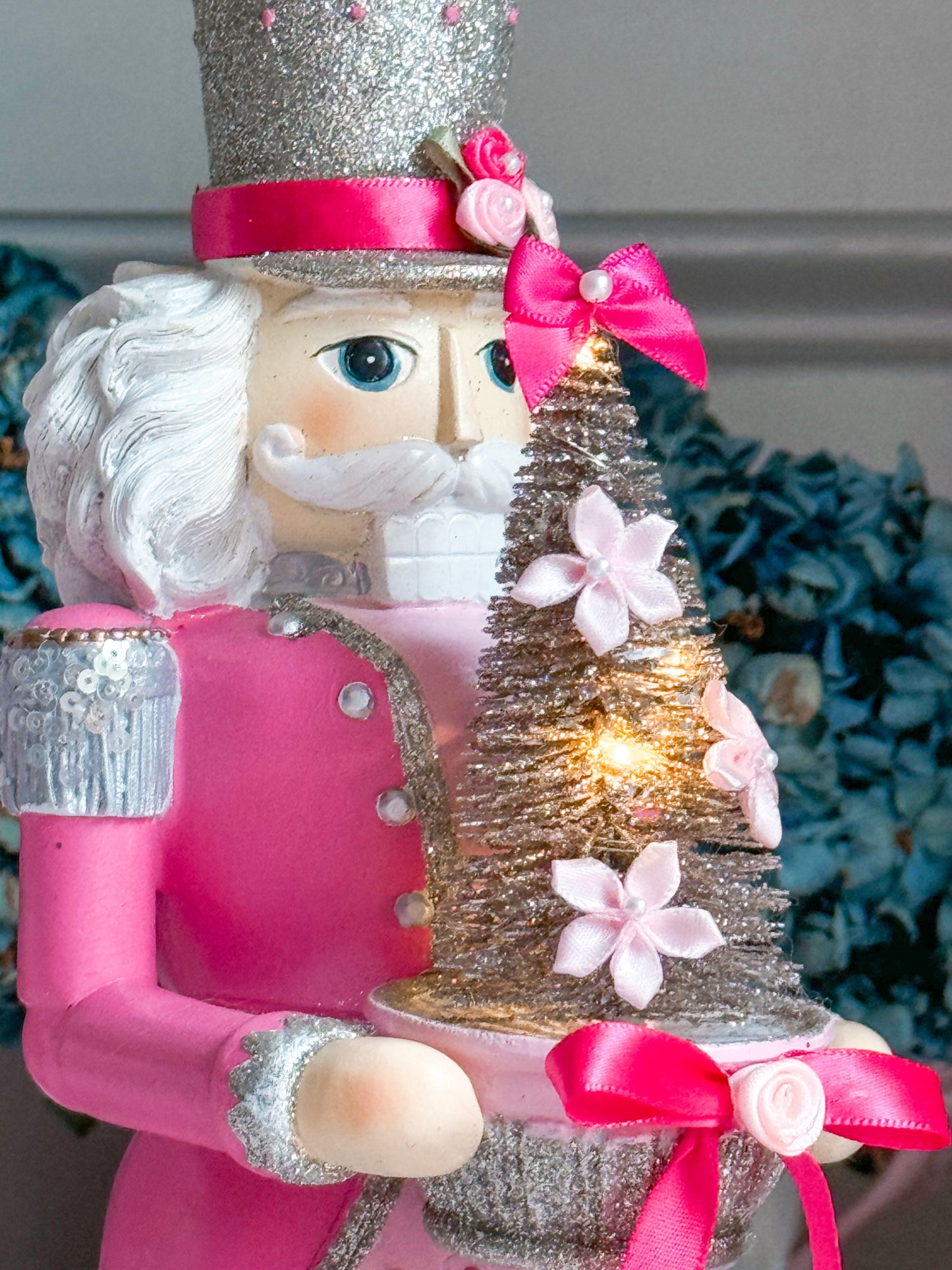 Bespoke Pink and Silver Hand Painted Nutcracker holding LED Light up Tree with Flowers and Bows