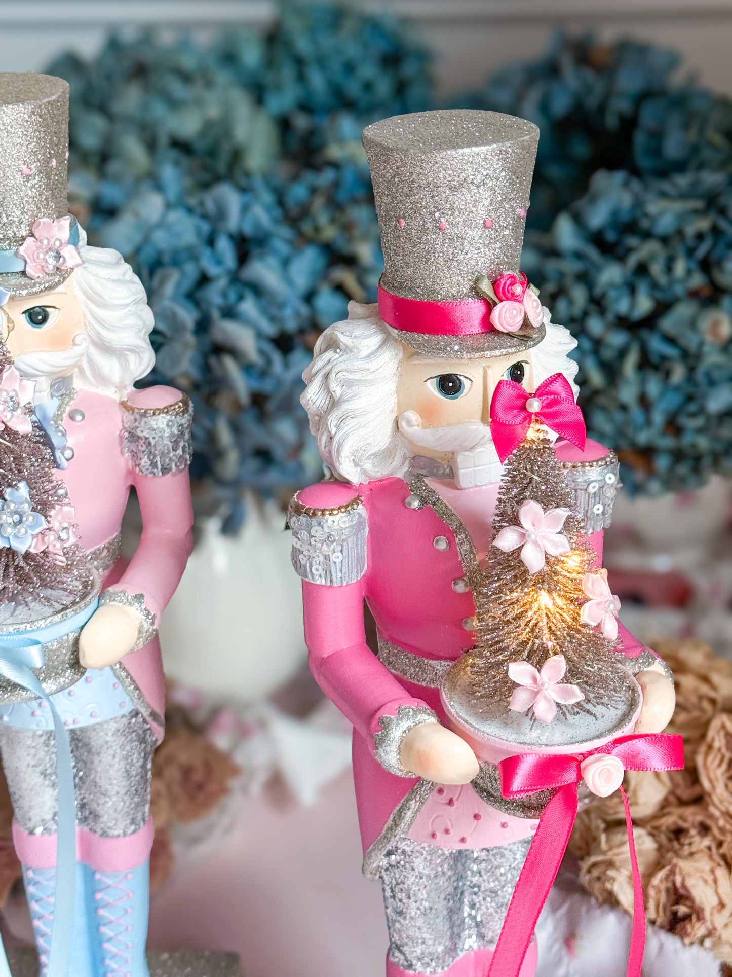 Bespoke Pink and Silver Hand Painted Nutcracker holding LED Light up Tree with Flowers and Bows