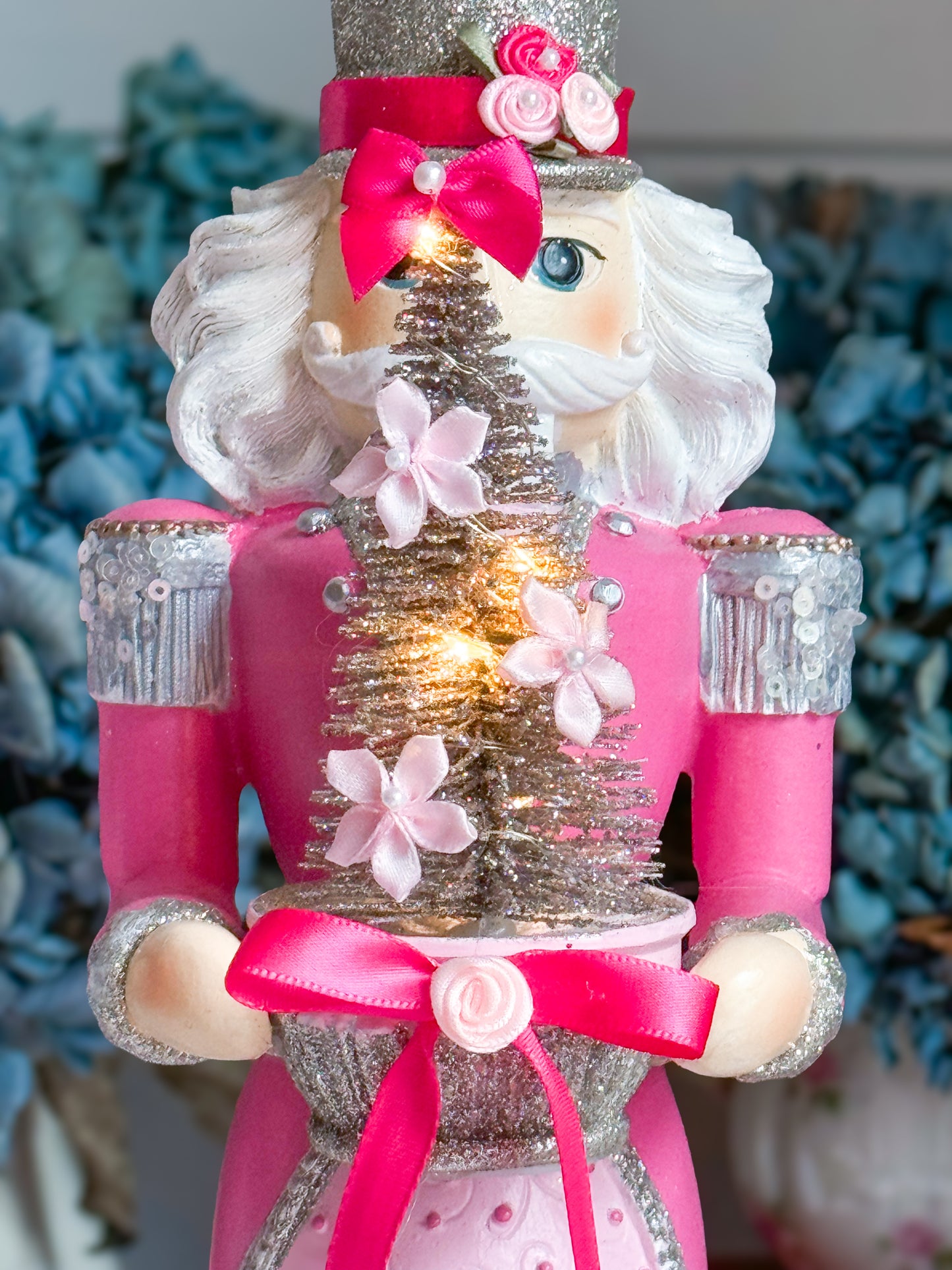 Bespoke Pink and Silver Hand Painted Nutcracker holding LED Light up Tree with Flowers and Bows