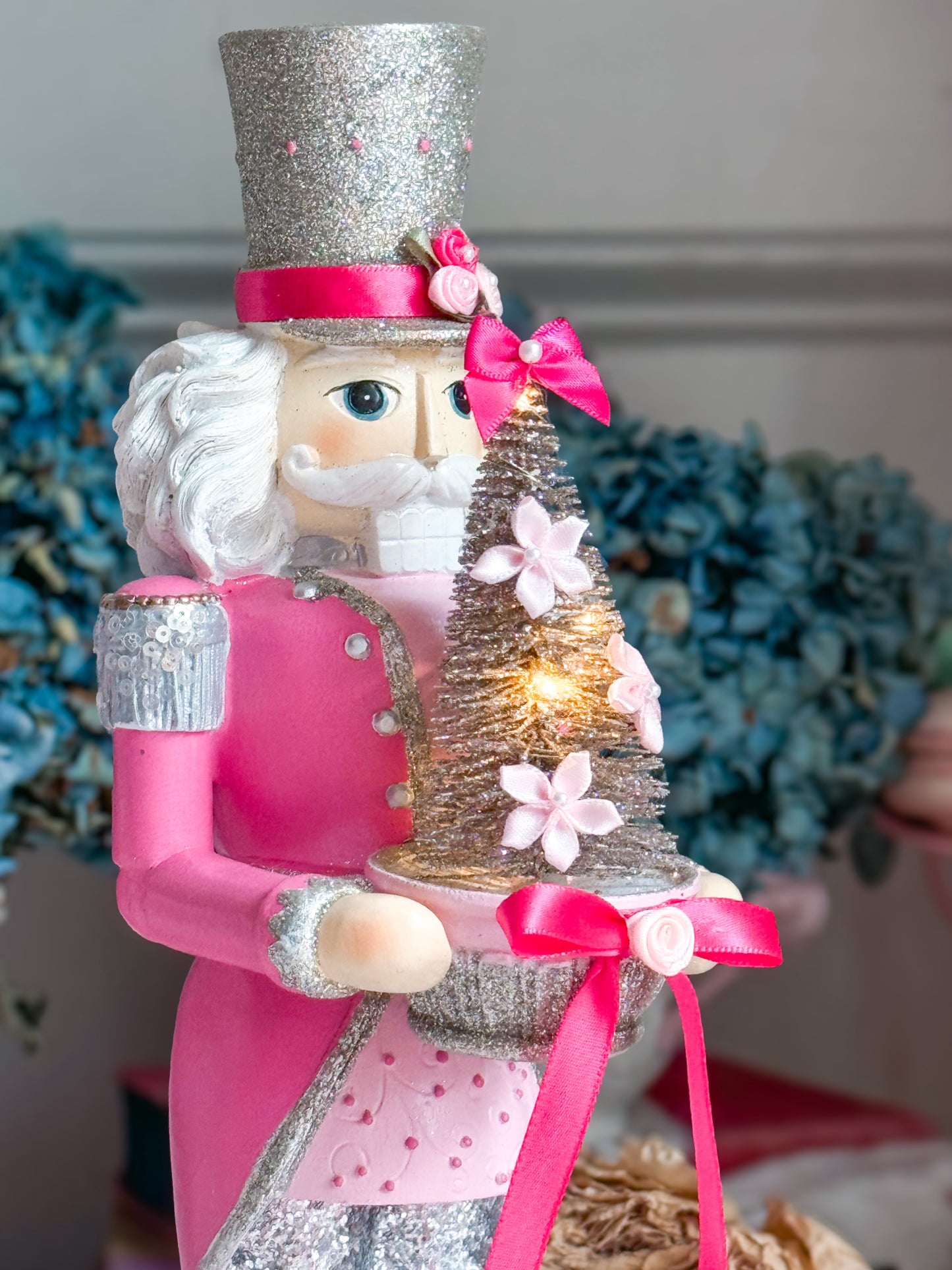 Bespoke Pink and Silver Hand Painted Nutcracker holding LED Light up Tree with Flowers and Bows