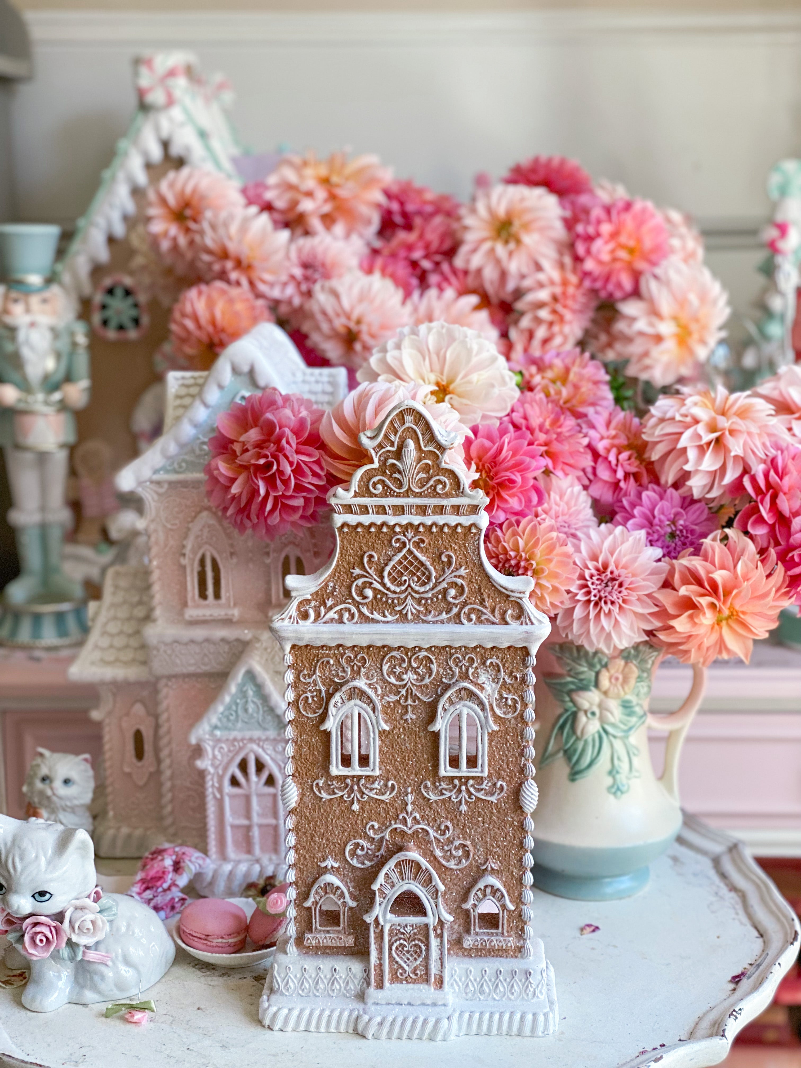 Pink pastel gingerbread house and pink macaroon tree store