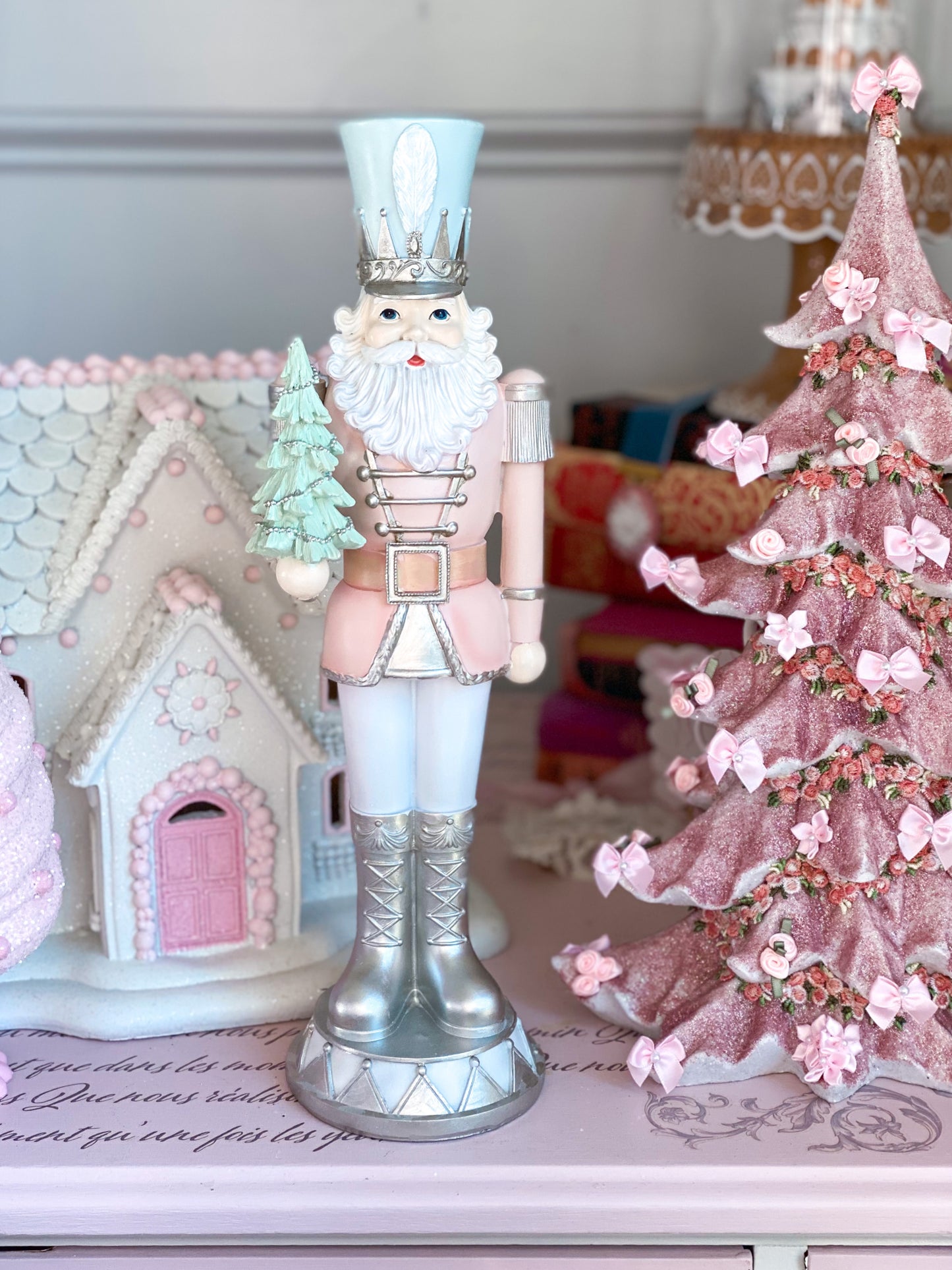 Pastel Pink, blue and Silver Nutcracker holding Christmas Tree