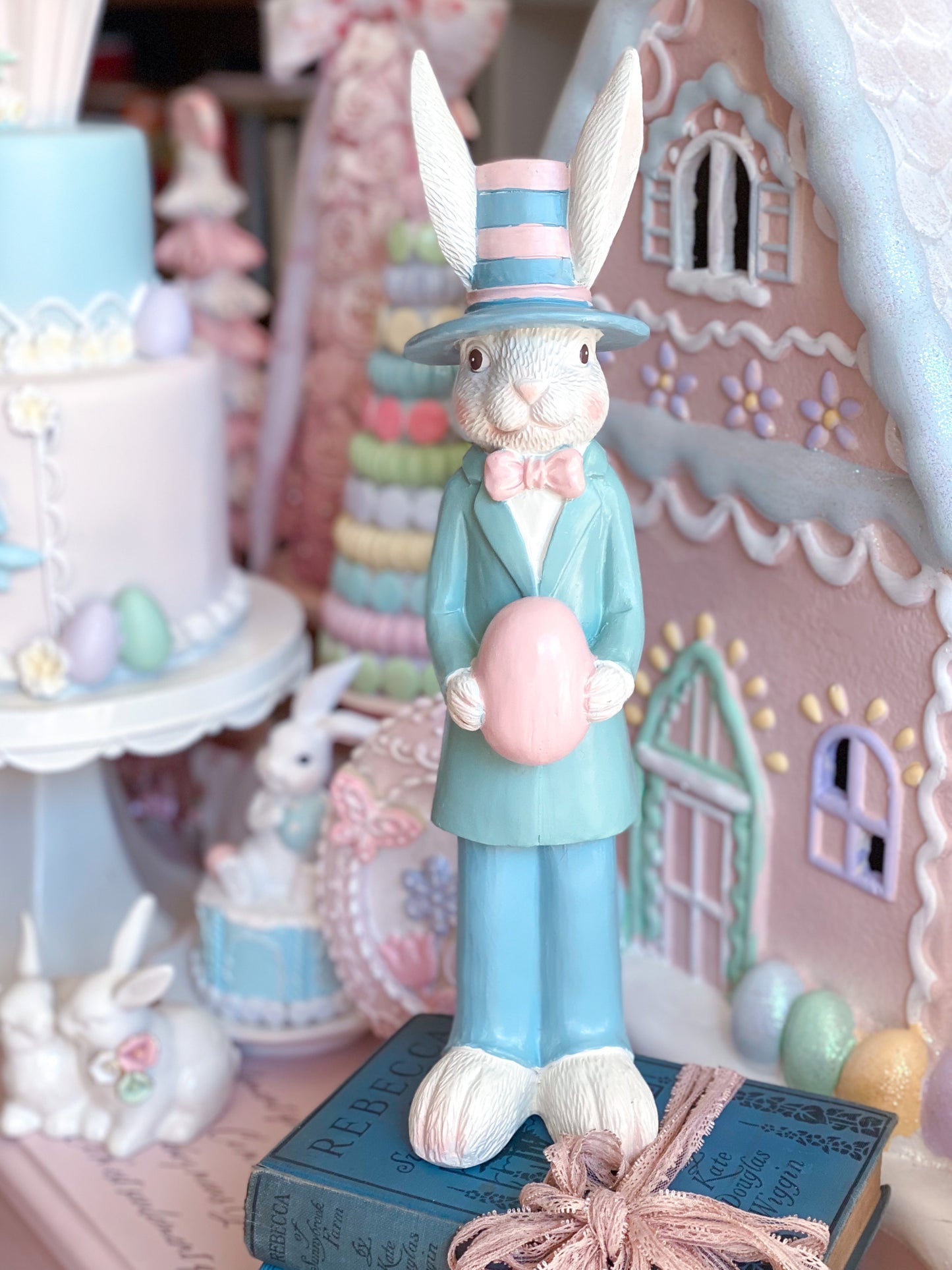 Pastel Pink and Blue Nutcracker Style Bunnies holding Easter eggs