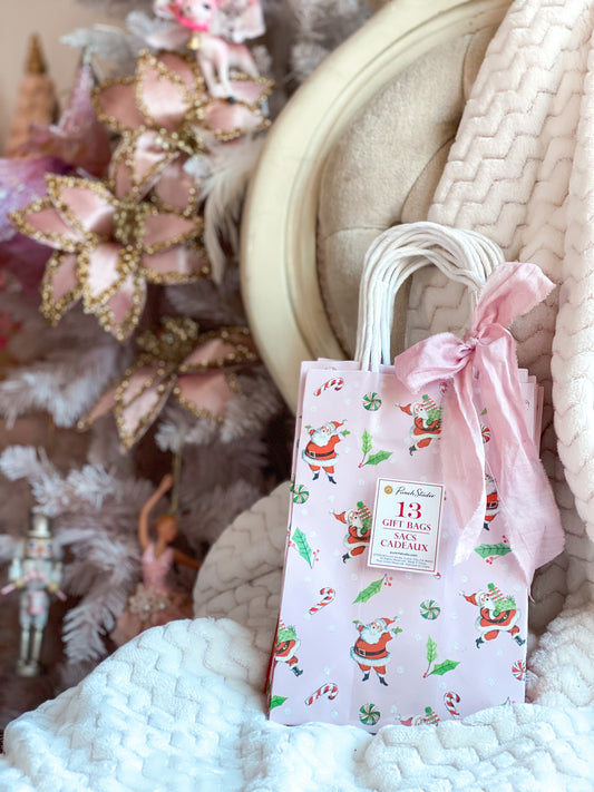 Set mit 13 kleinen rosa Weihnachtsmann-Geschenktüten