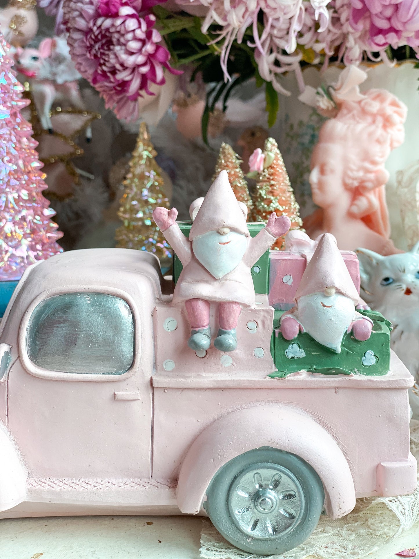 Pink Pickup Truck with presents and gnomes in the back