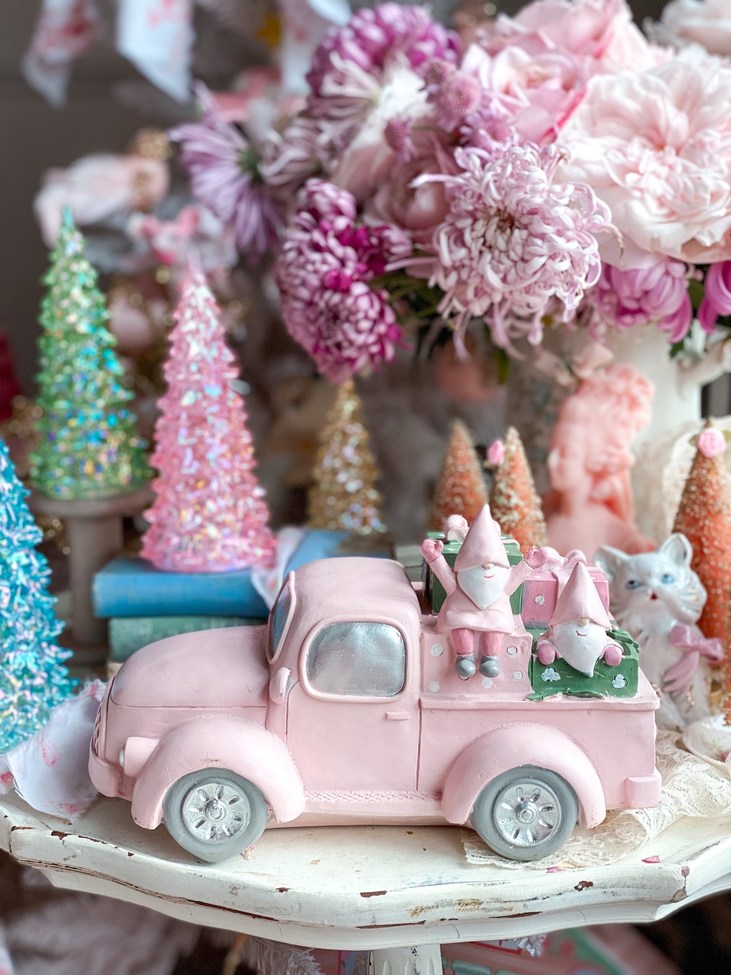 Pink Pickup Truck with presents and gnomes in the back