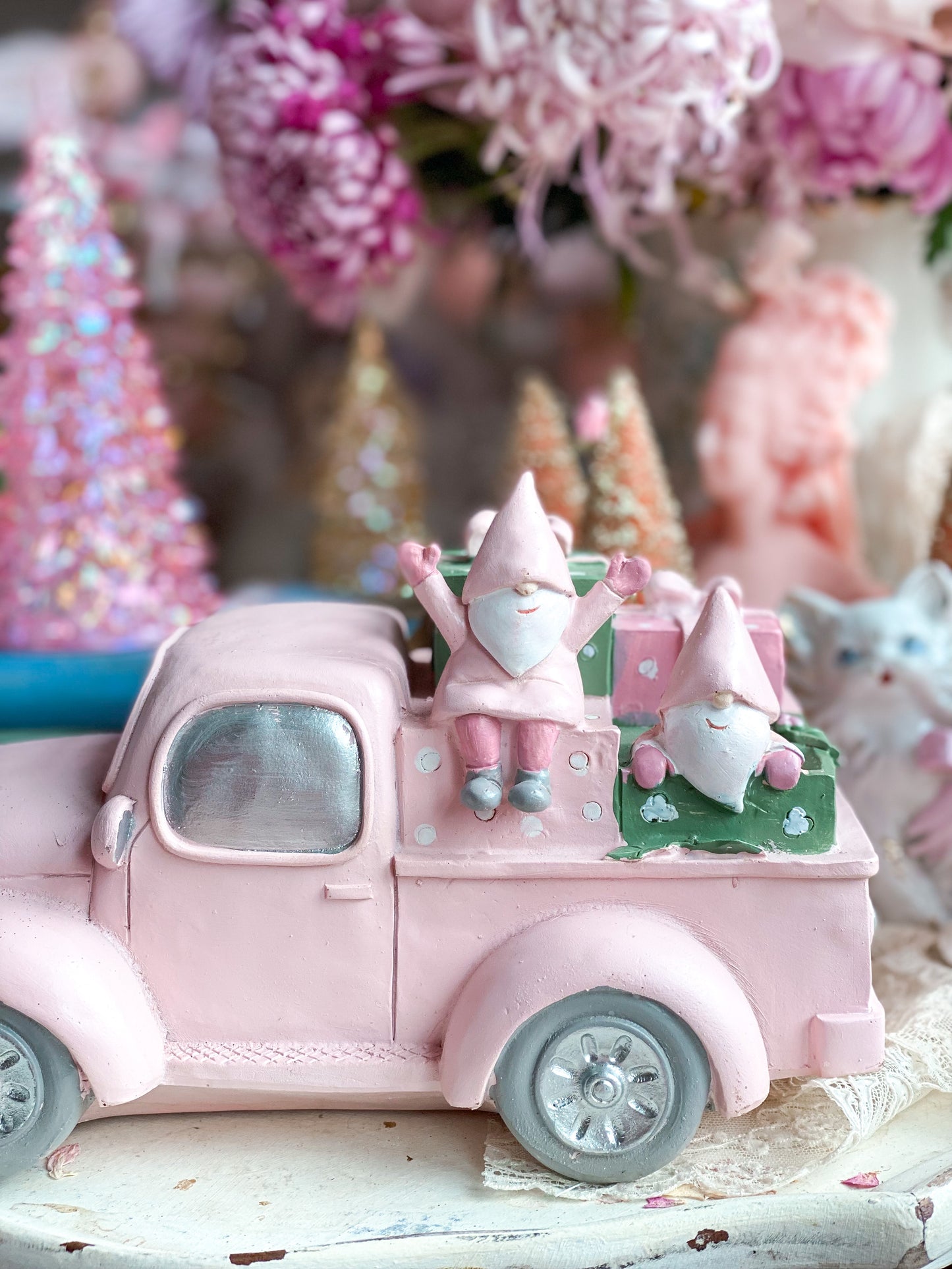 Pink Pickup Truck with presents and gnomes in the back