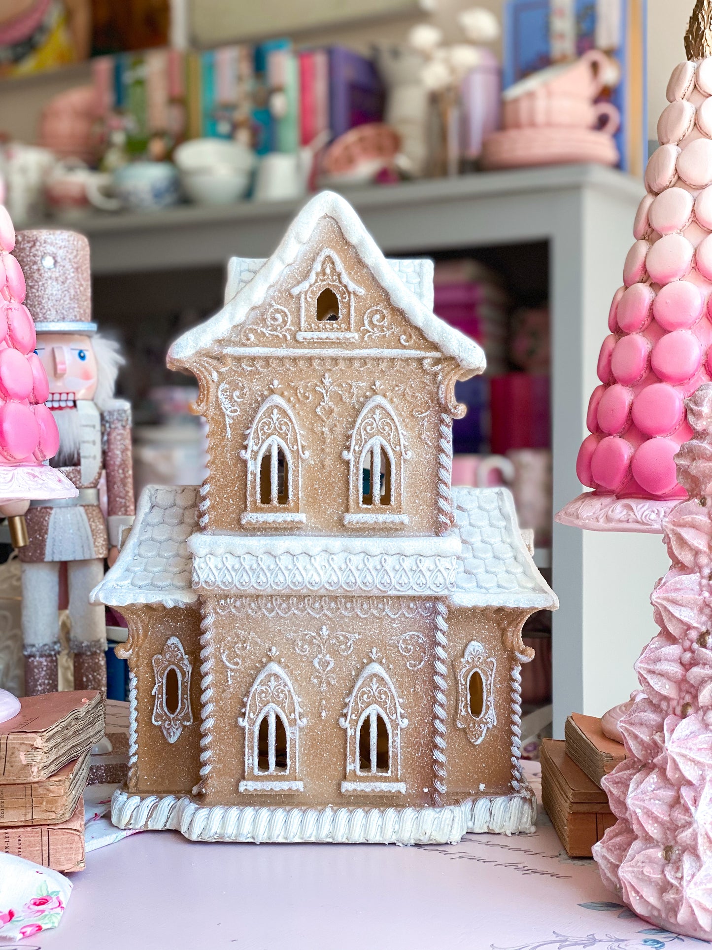 Neutral Gingerbread Mansion with ornate icing design